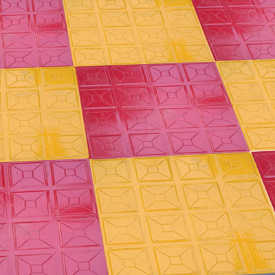 Coloured concrete floor tiles